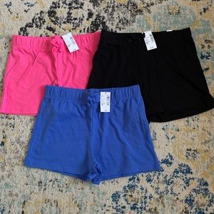 3 pairs of Children’s Place girls shorts, size 10/12. Blue, black and pink